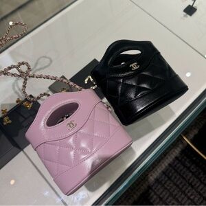 CHANEL Black Mini Bag with Structured Design
